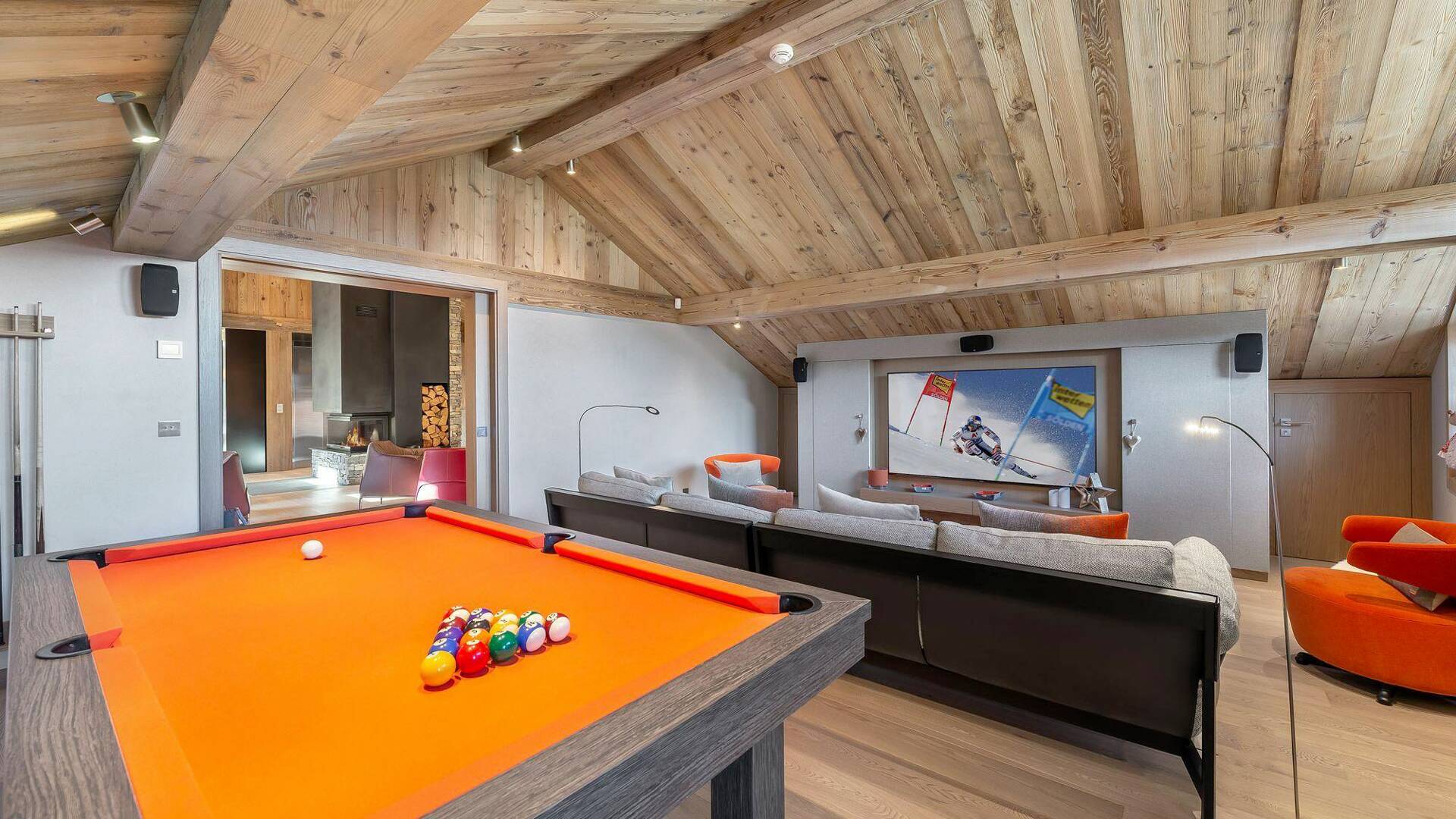 luxury living room with large sofa and billiard