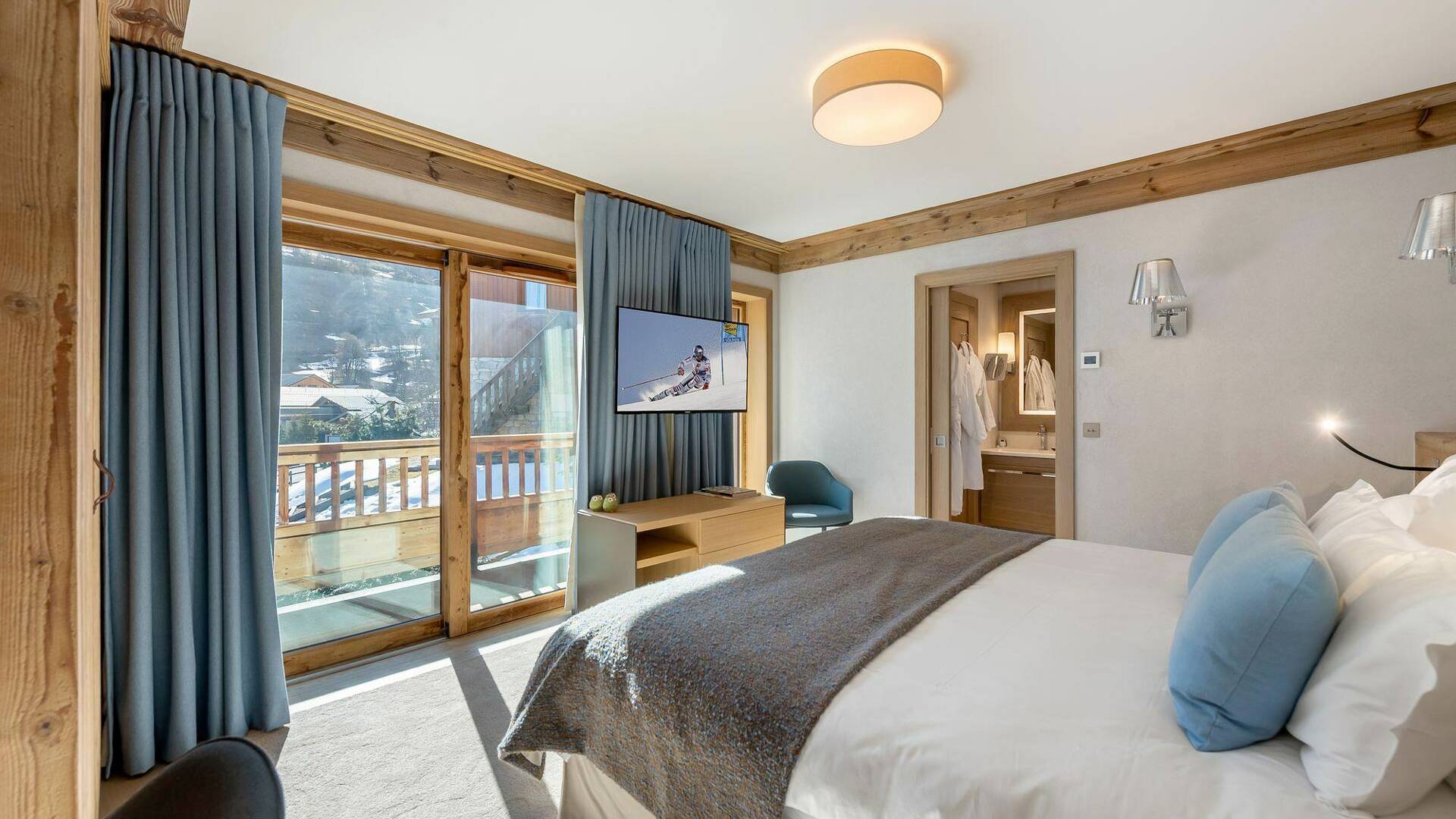 beautiful double bedroom with french window and en suite bathroom