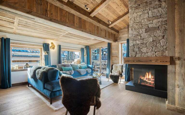 comfortable living room with large sofa and fireplace 