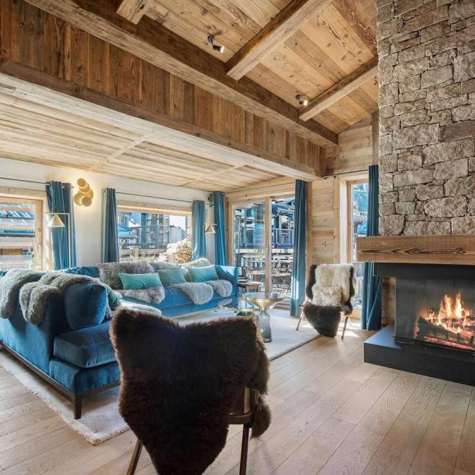 comfortable living room with large sofa and fireplace 