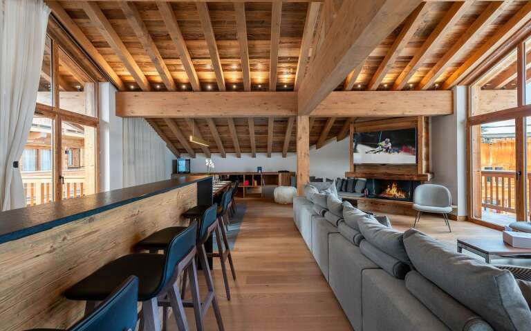 open space with countertop and living room 