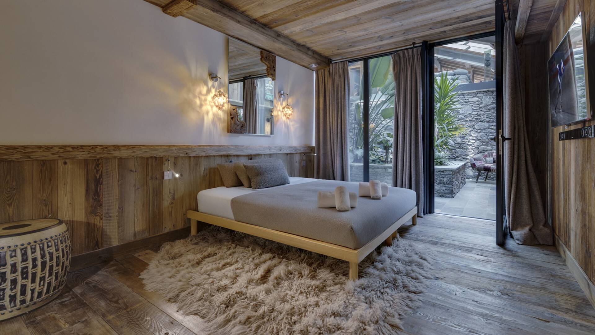 en suite double bedroom with outdoor access