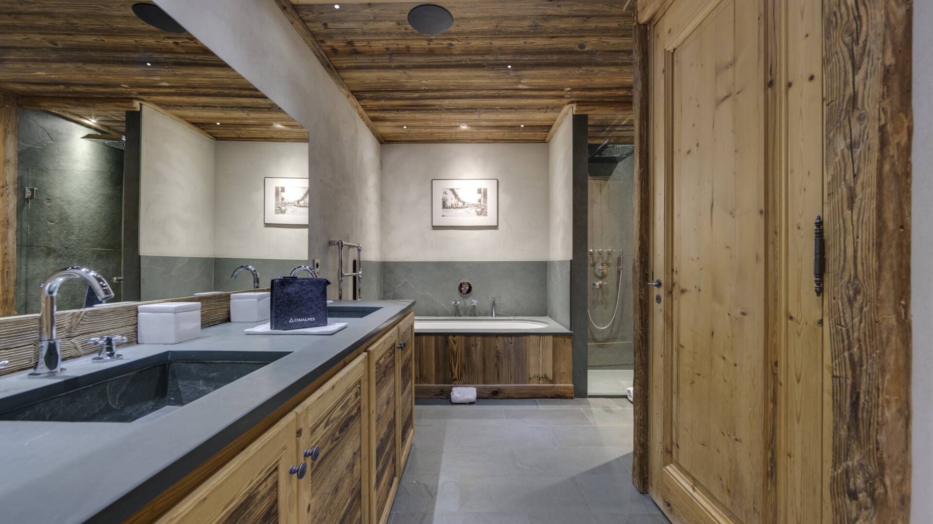 en suite bathroom with bath tub and walk in shower