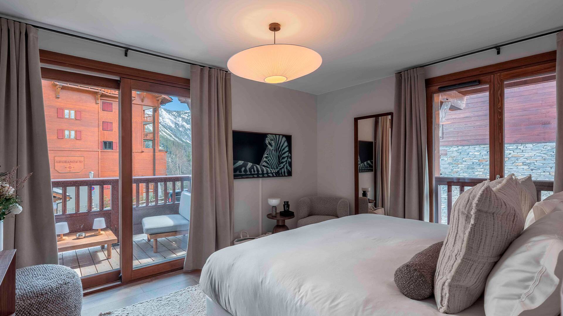 large double bedroom with balcony and reading corner