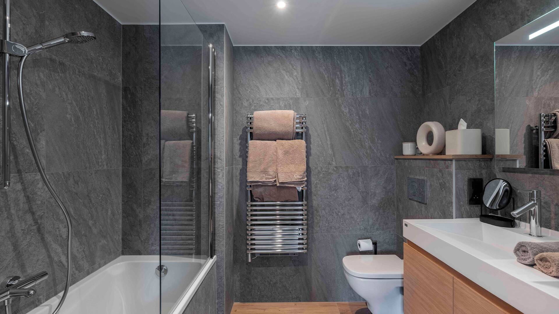 en suite bathroom with bath tub 