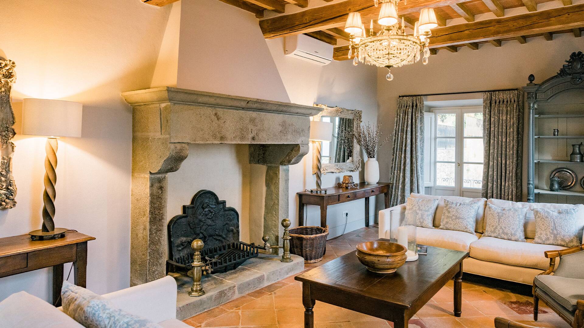 living room with comfortable sofas and fireplace