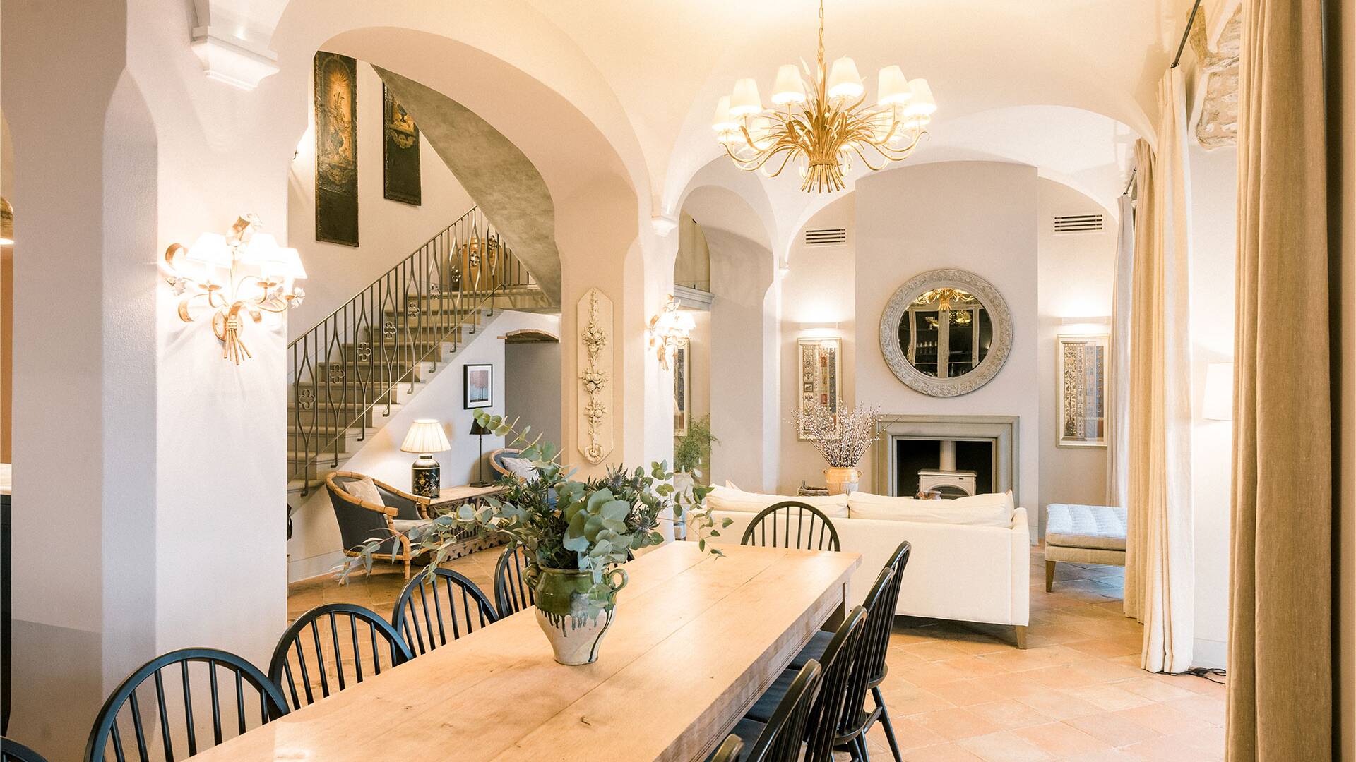 beautifully designed living space with vaulted cieling
