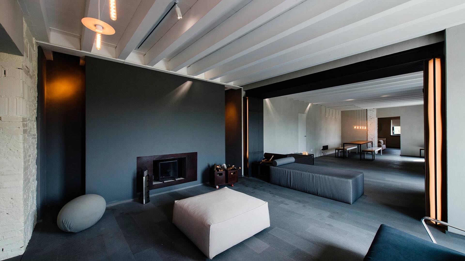 lounge room with fireplace and sofas