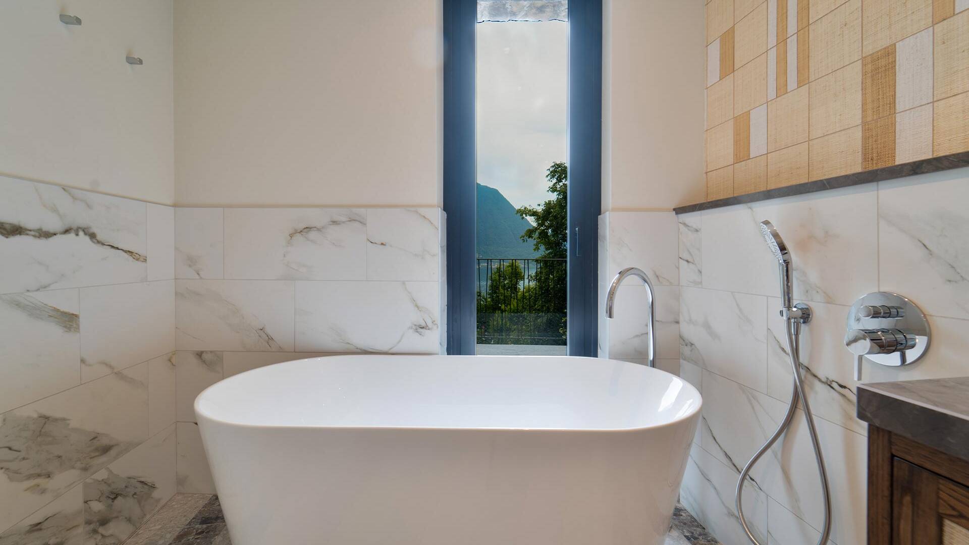 en suite bathroom with bathtub 