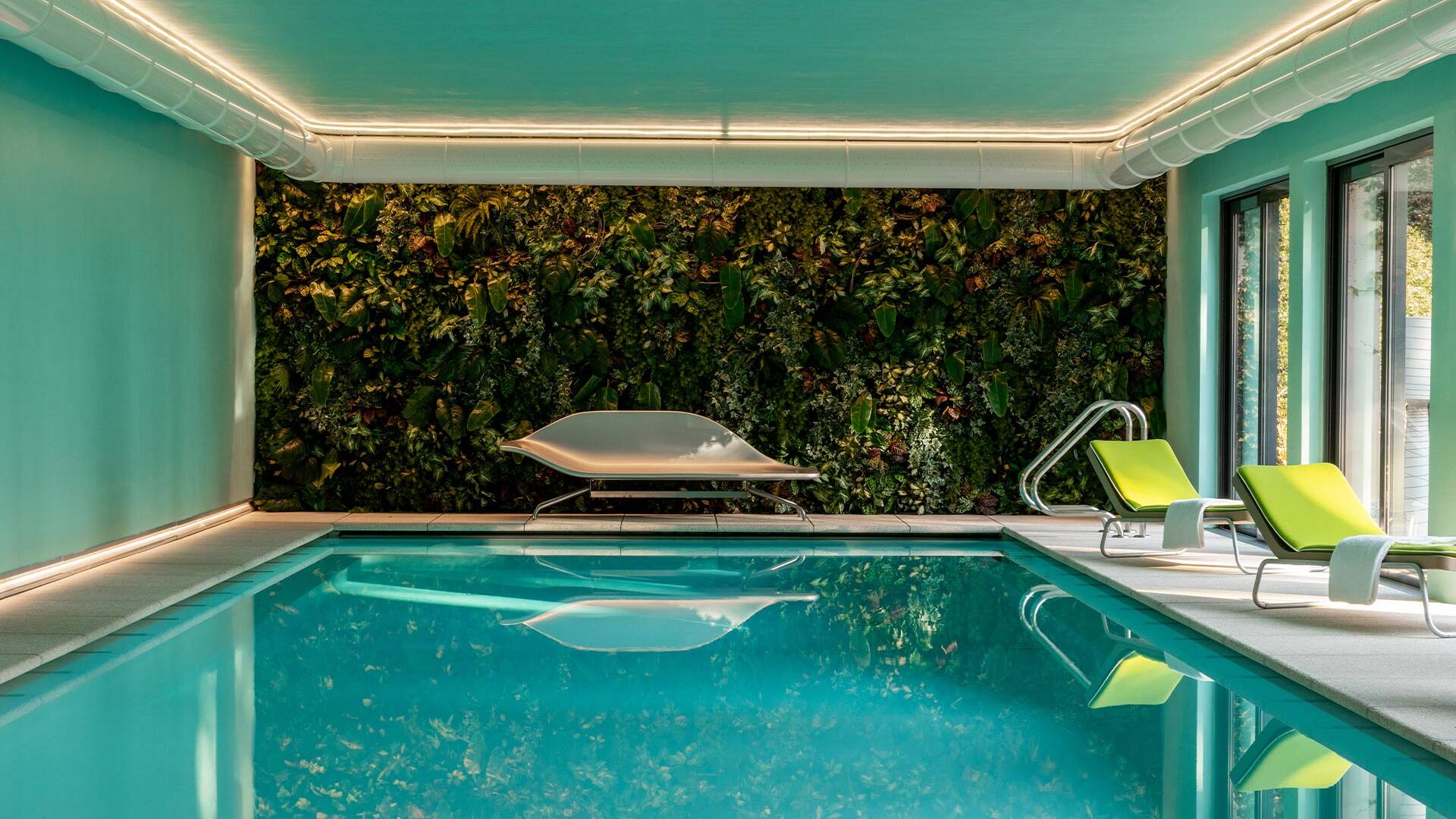 indoor pool and lounge chairs