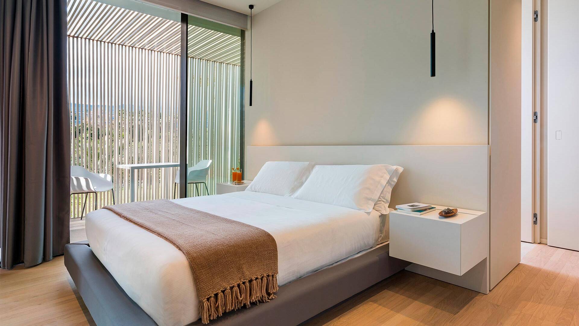en suite double bedroom with outdoor space