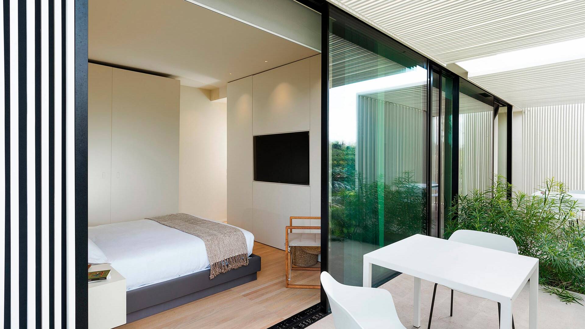 en suite double bedroom with outdoor space