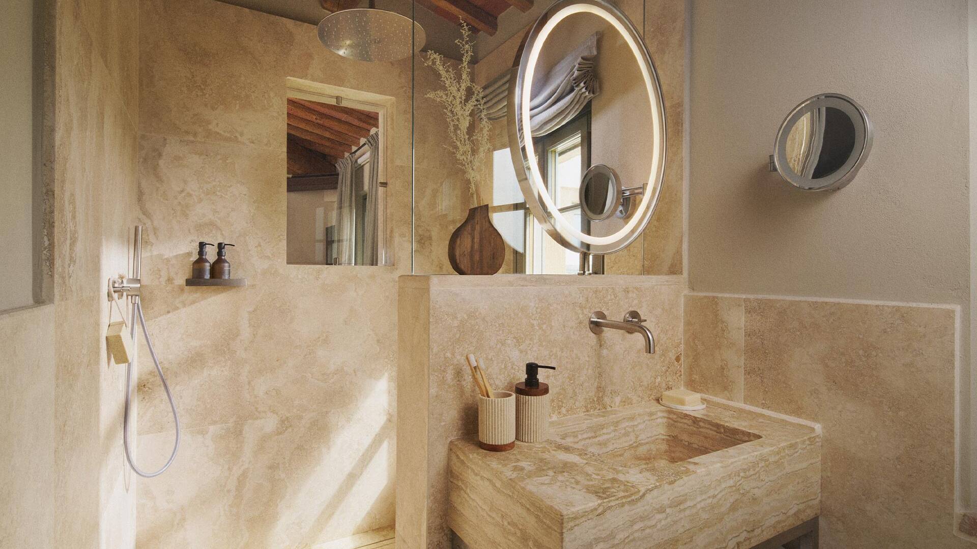 en suite bathroom with marble sink and large walk-in shower