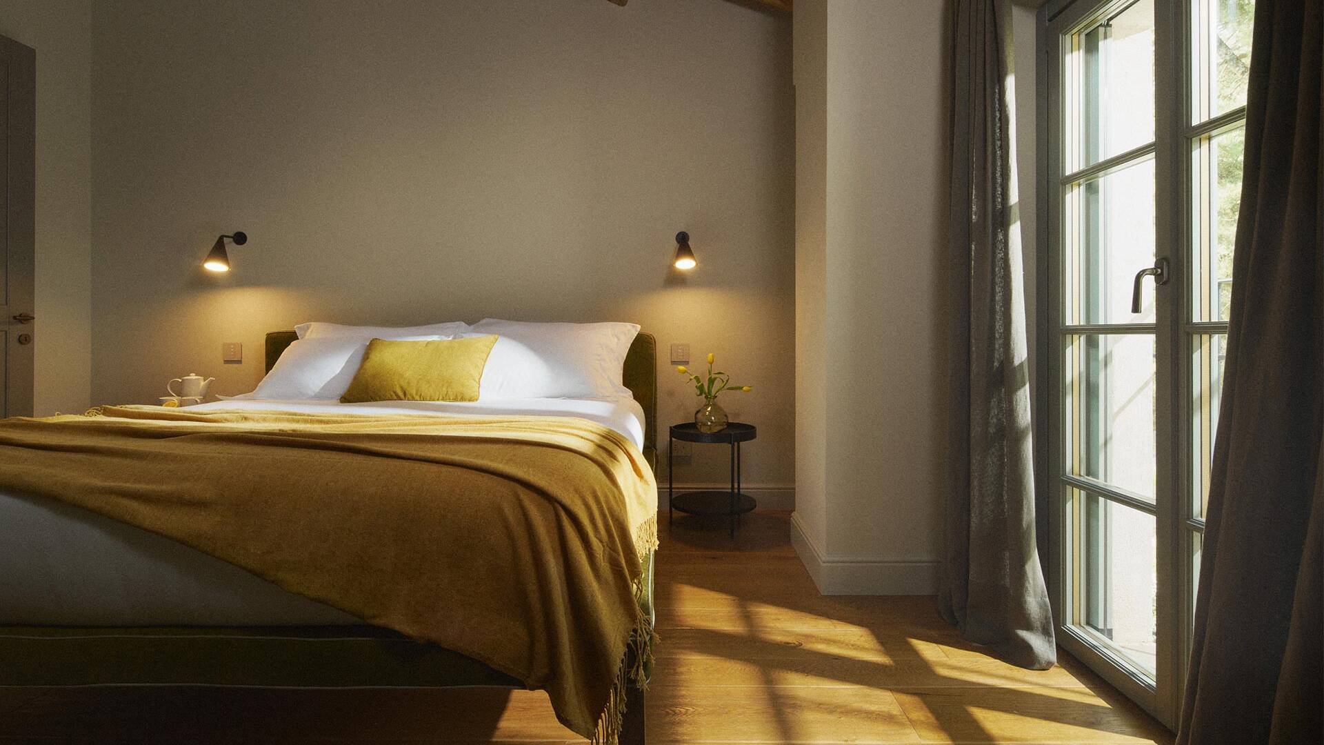 en suite double bedroom with large window