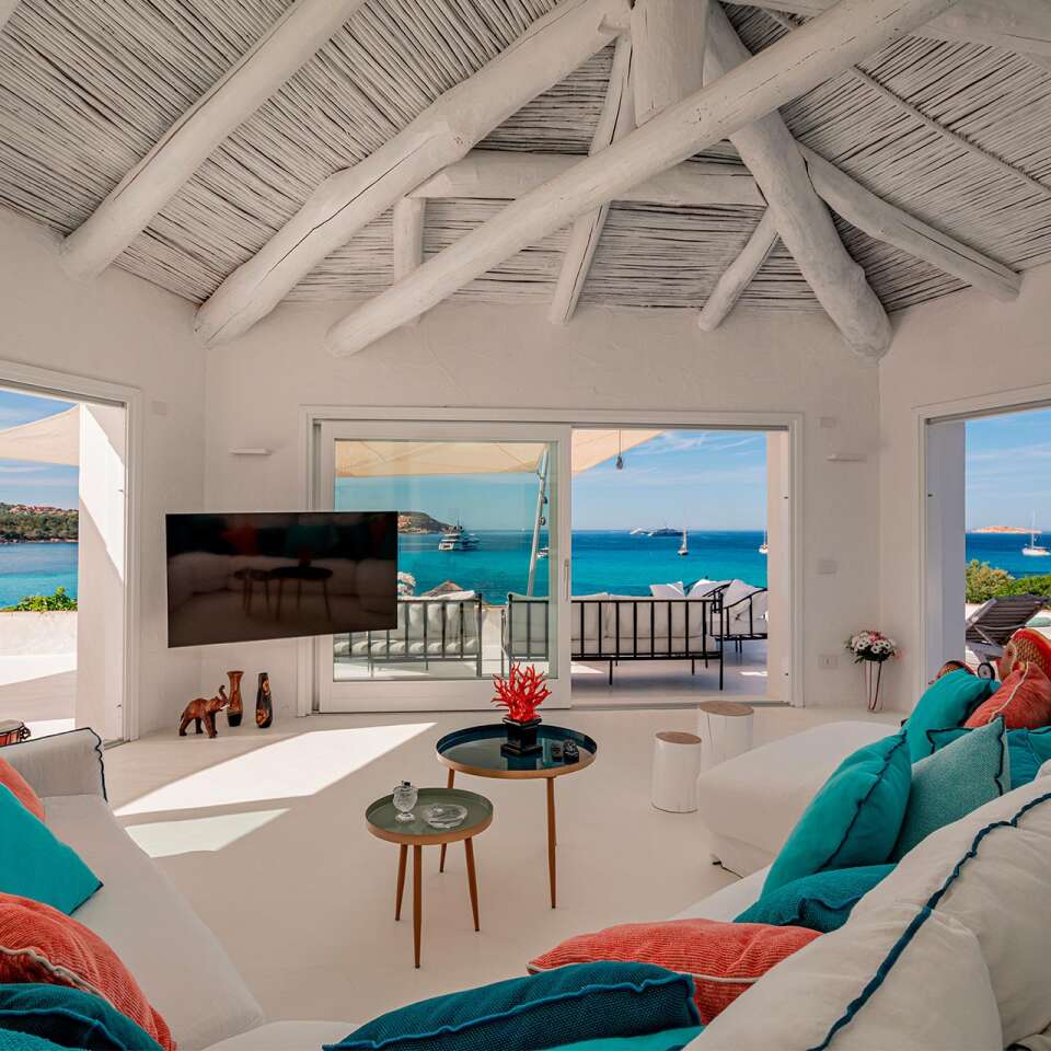 living room with comfortable sofa and seaview