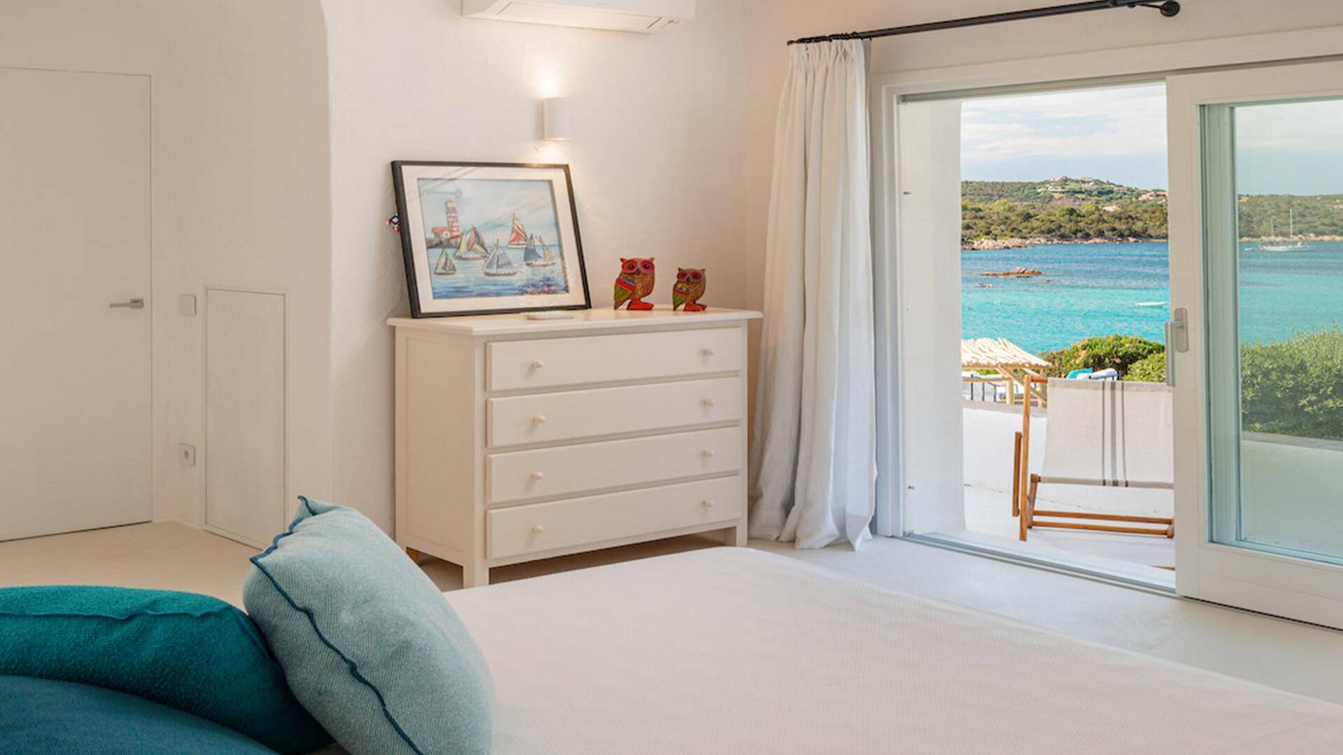 en suite double bedroom with seaview