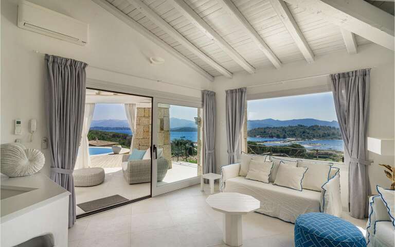 main villa living room with direct access to the outdoors