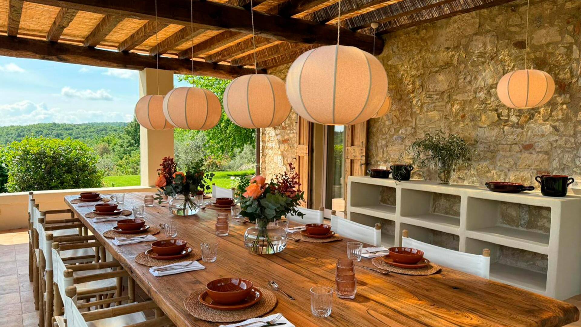 covered terrace with wooden table for al fresco dining