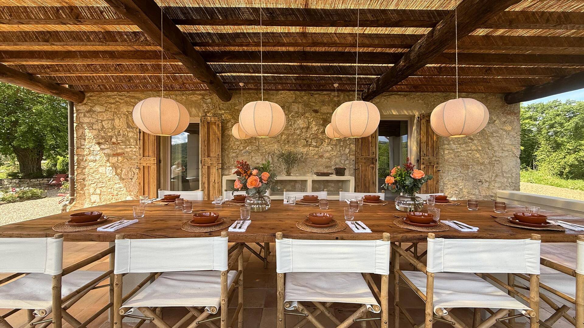 covered terrace with wooden table for al fresco dining