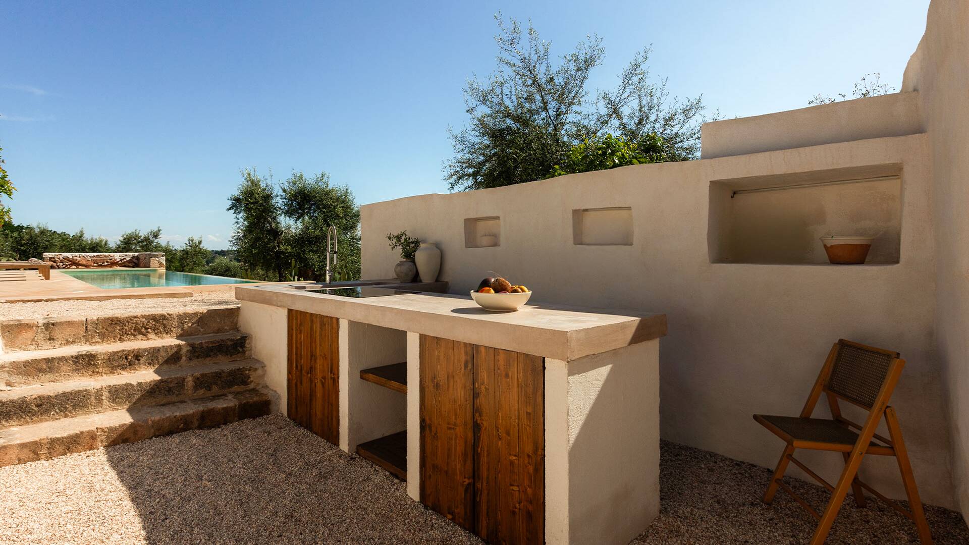 outdoor kitchen in the pool area