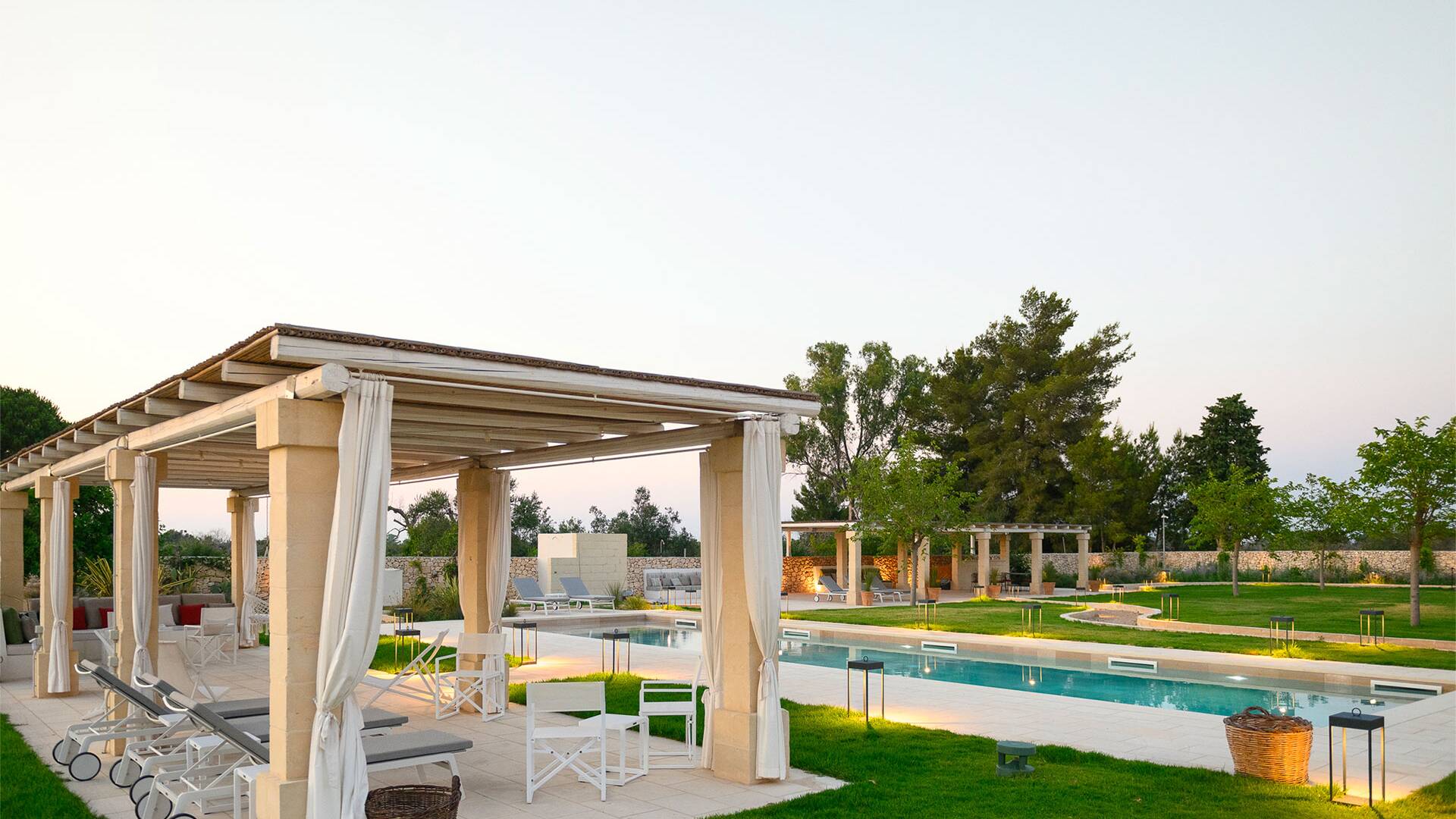 pool area with pergola and lounge area