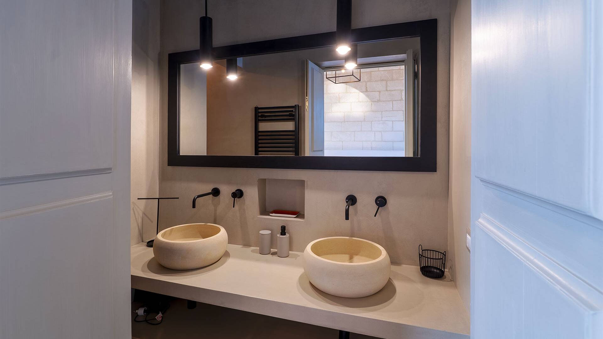 en suite bathroom with double sink