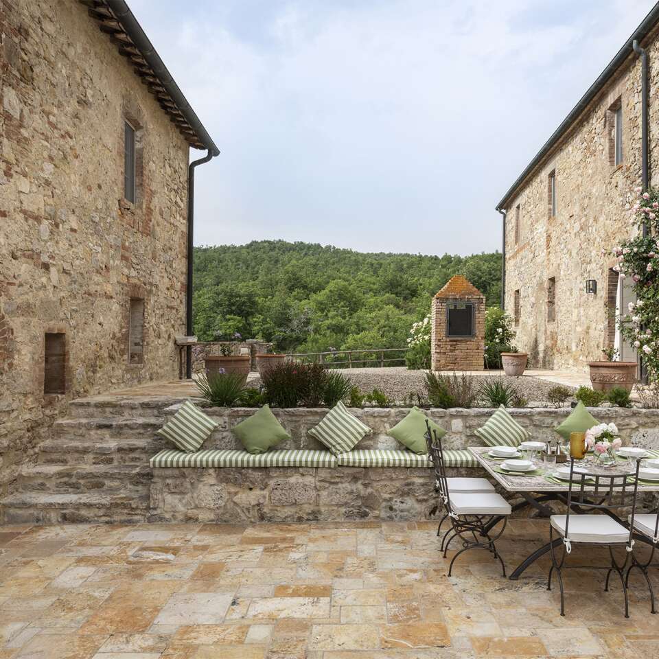 outdoor lounge area between the main villa and guest house