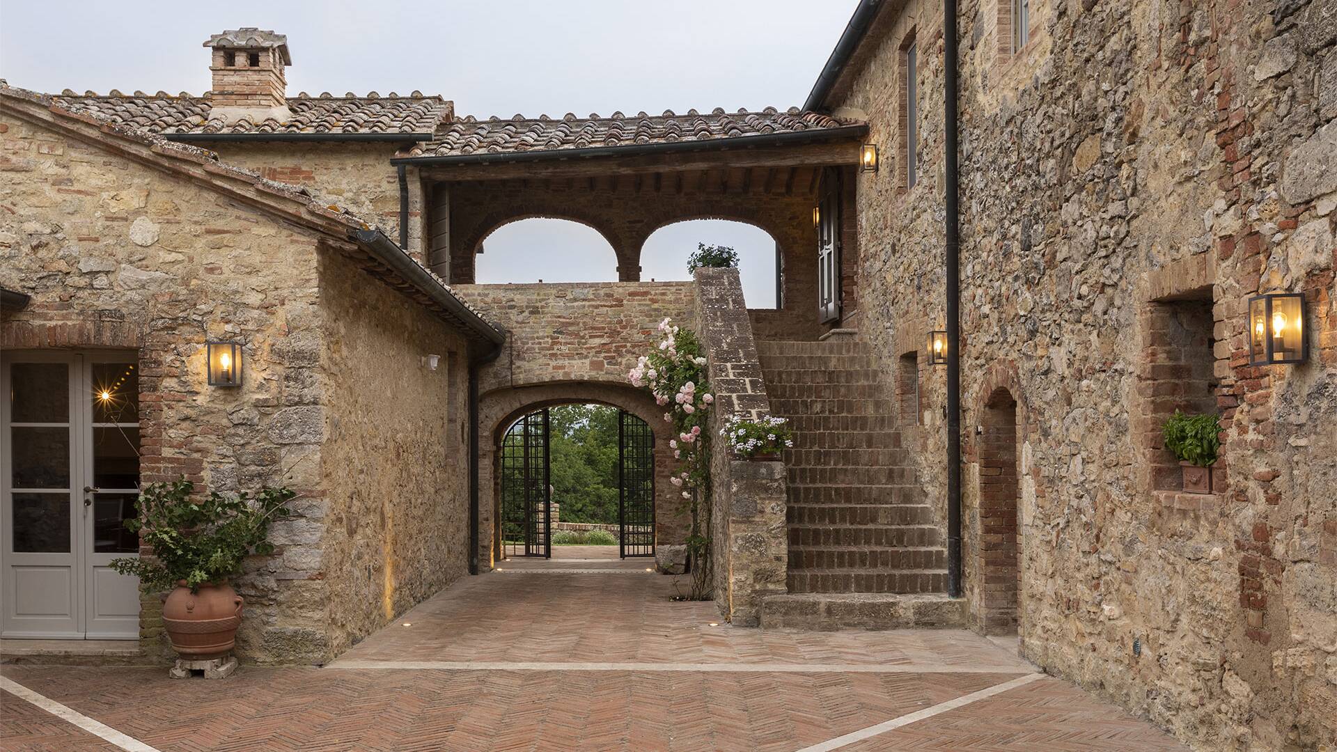 courtyard with al fresco dining area and covered lounge space