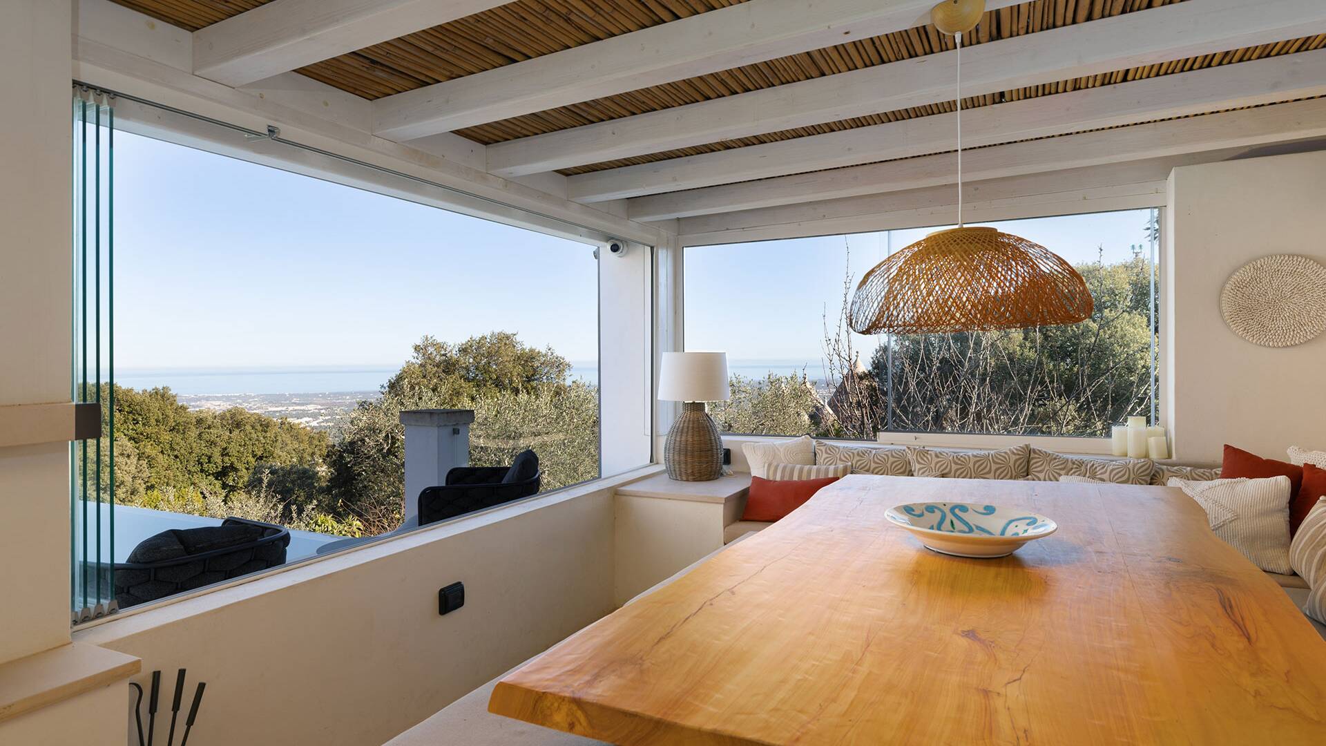 pool house with dining table 