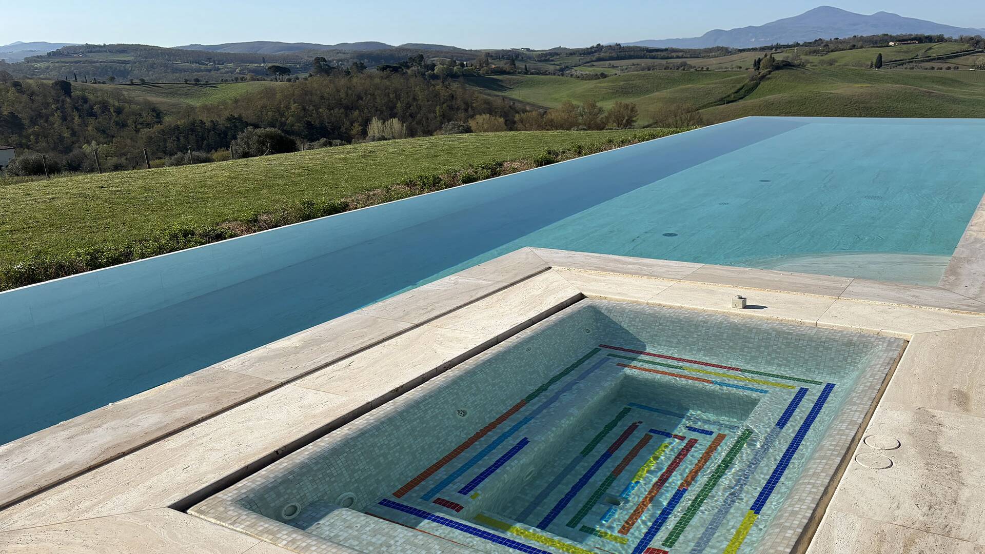 luxury pool with Jacuzzi corner and Tuscan view