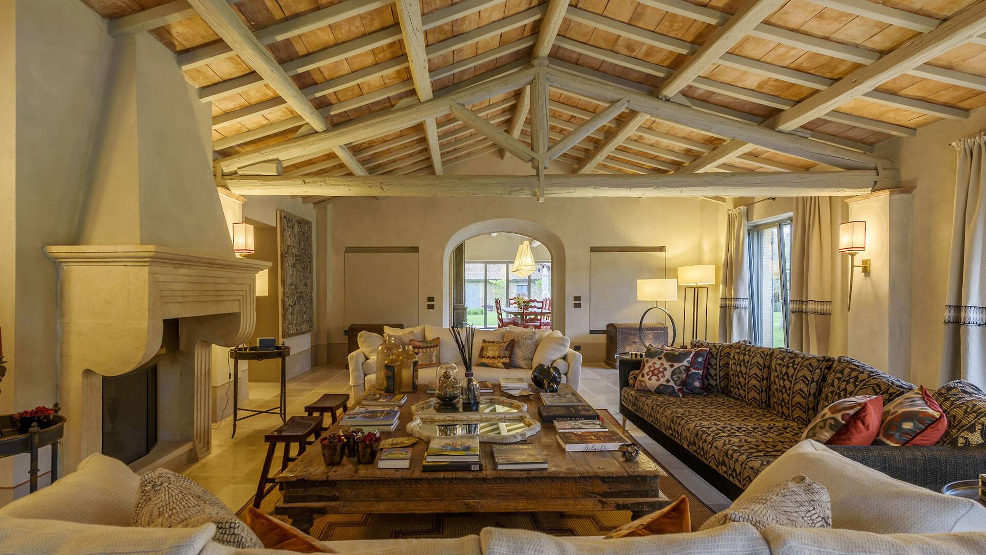 large living room with fireplace and comfortable sofas