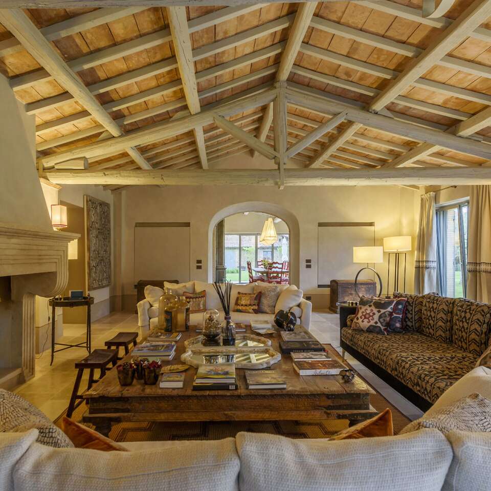 large living room with fireplace and comfortable sofas