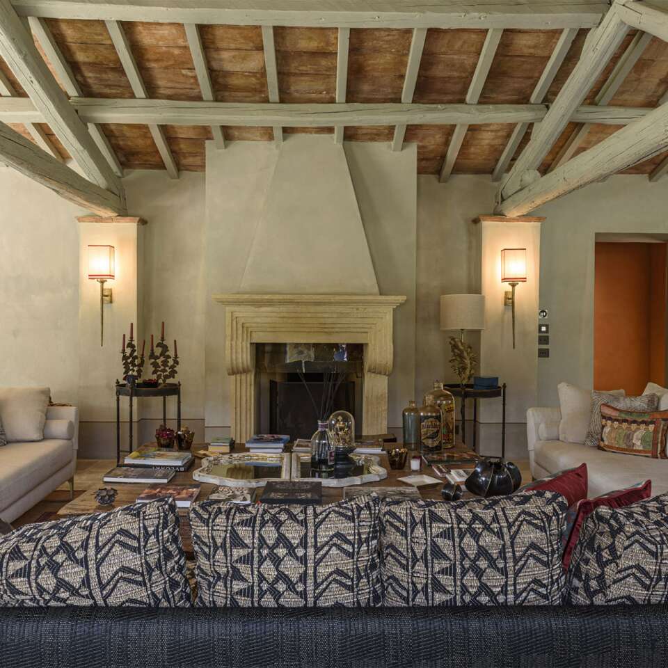 large living room with fireplace and comfortable sofas