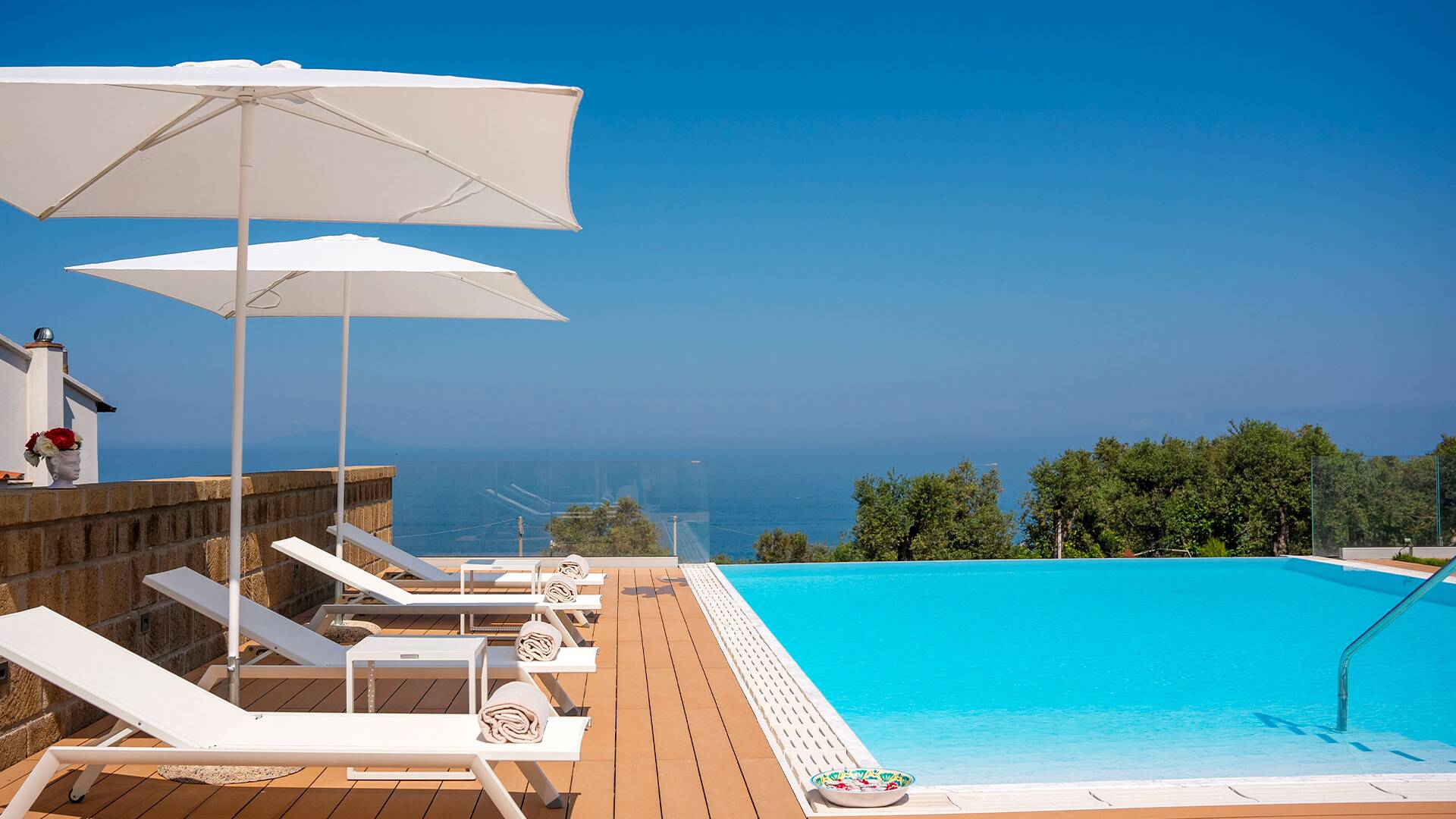 infinity swimming pool with sun deck