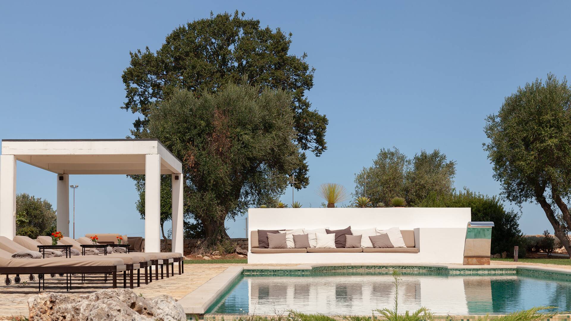 outdoor area with infinity swimming pool 