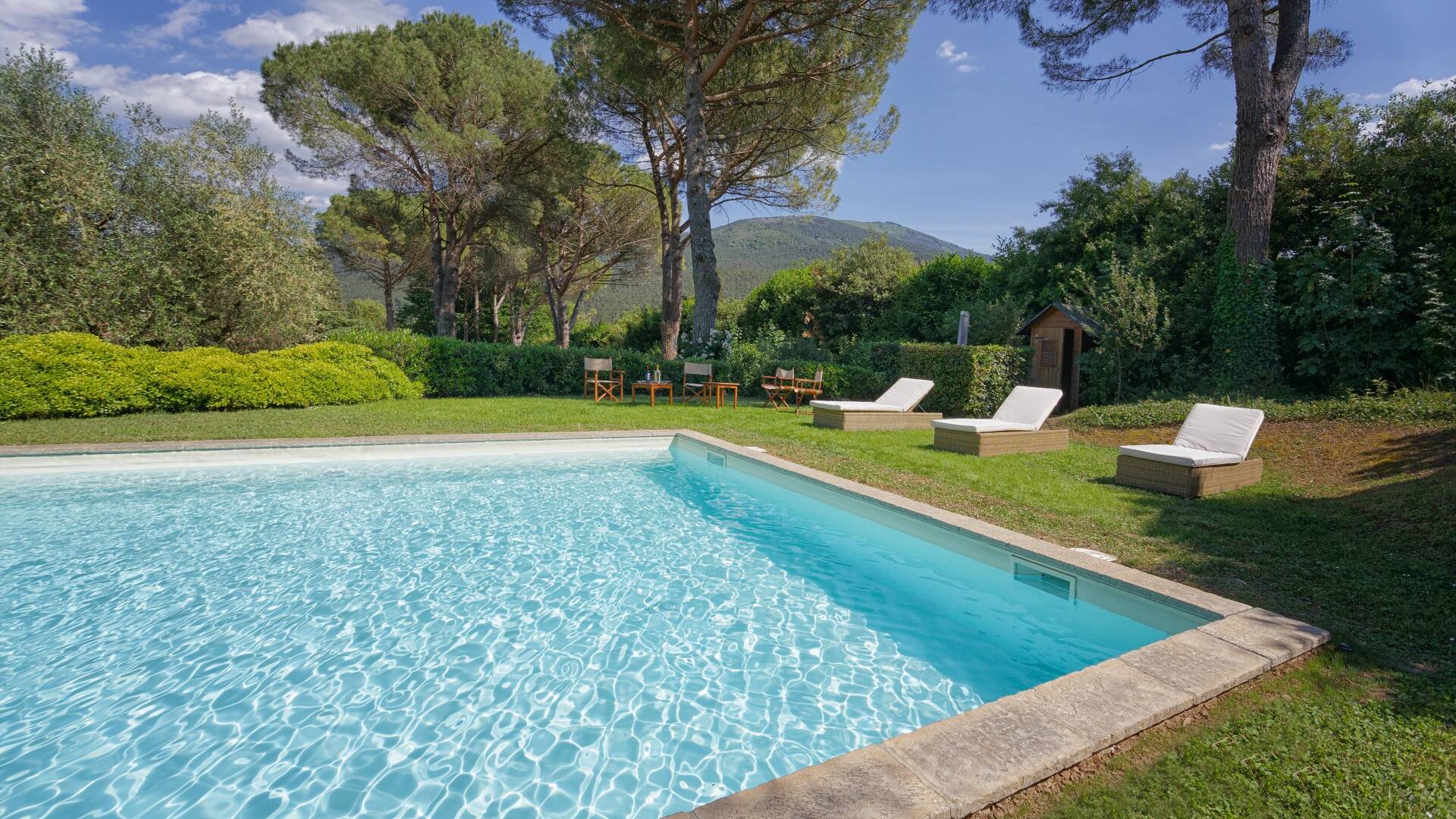 private swimming pool with sunbathing area