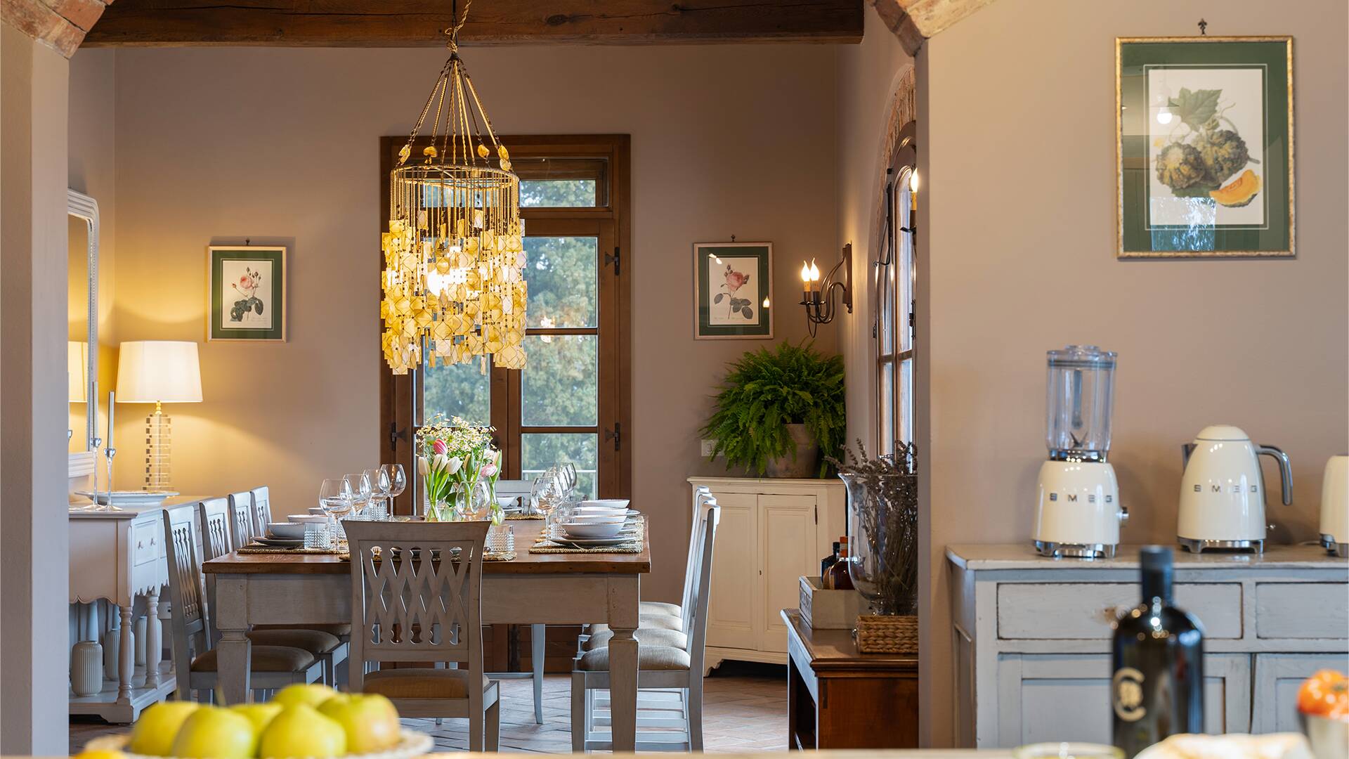 open space with gourmet kitchen and dining table