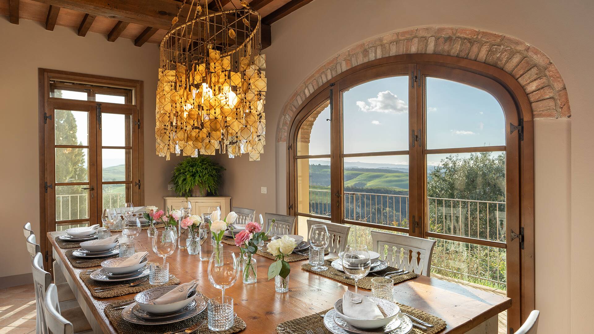 luxury dining area with view over Tuscan countryside