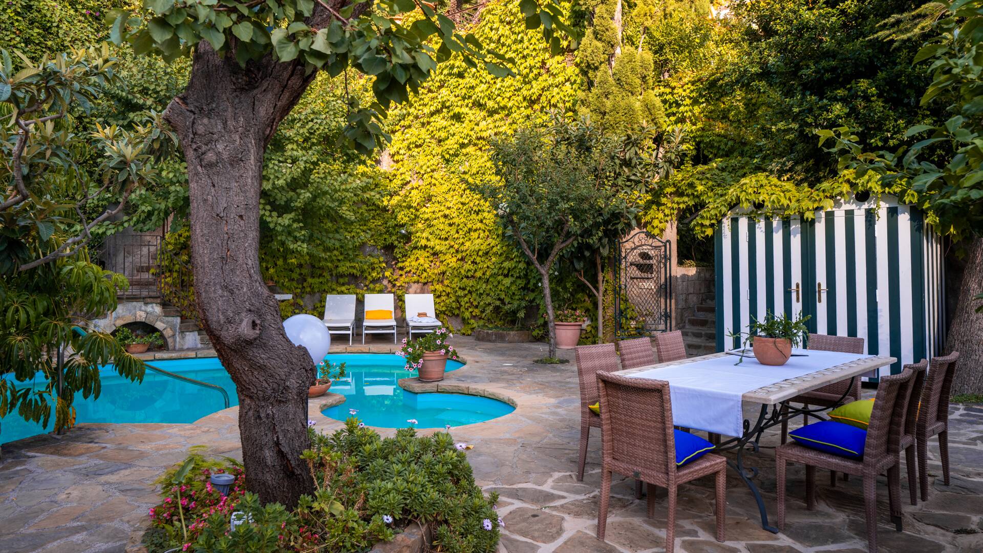 private swimming pool with dining table