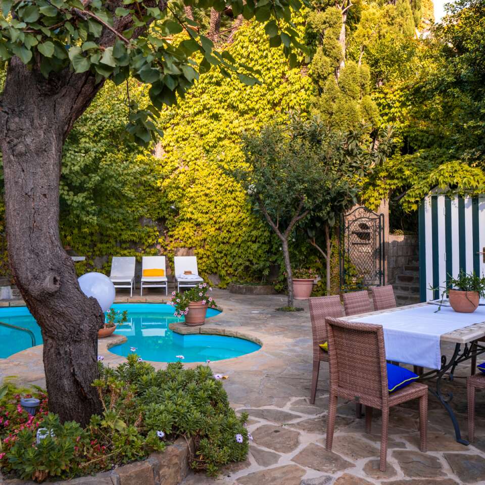 private swimming pool with dining table