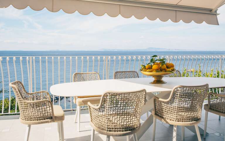 alfresco dining area with sweeping sea views