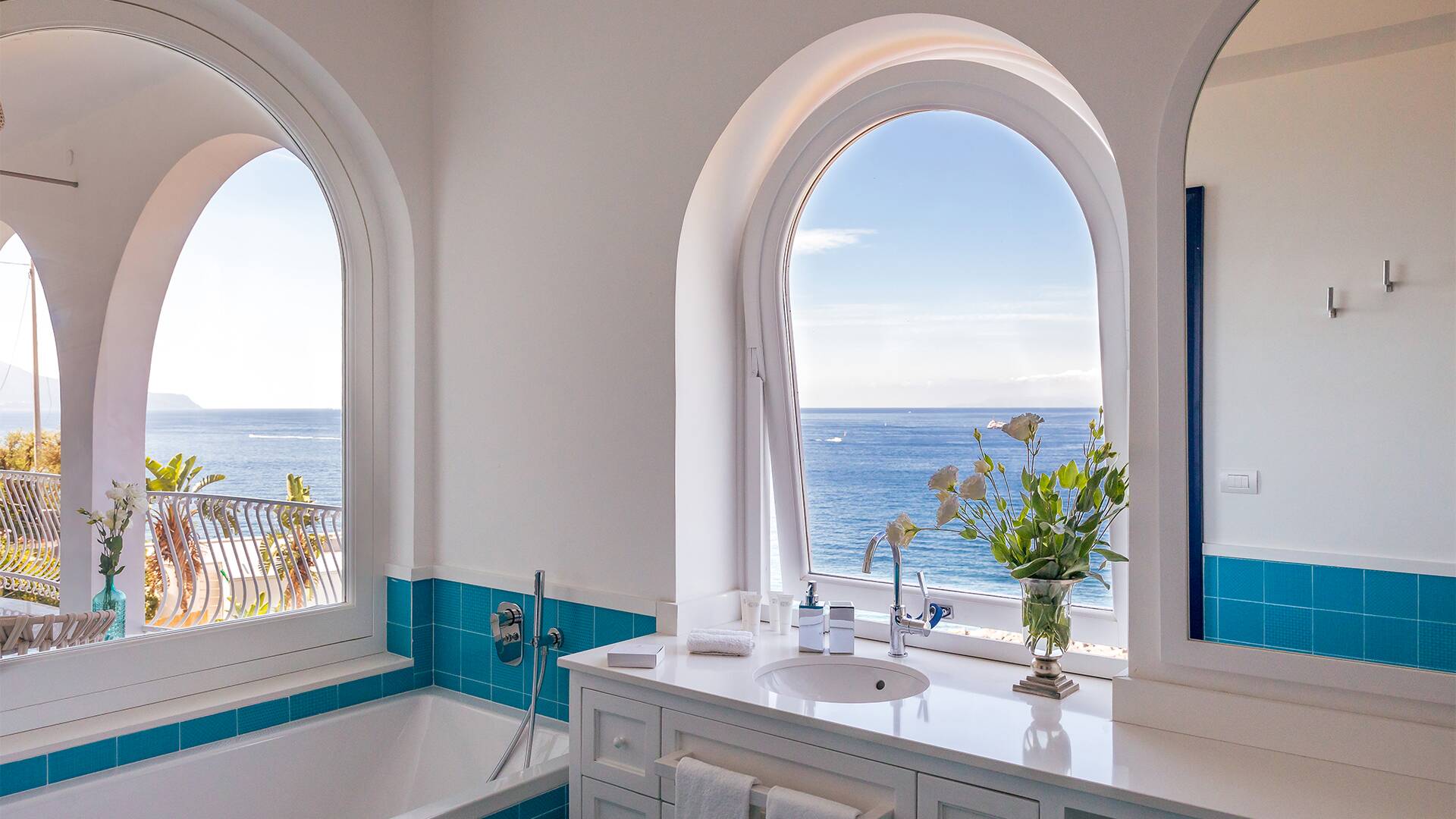 en suite bathroom with bath tub