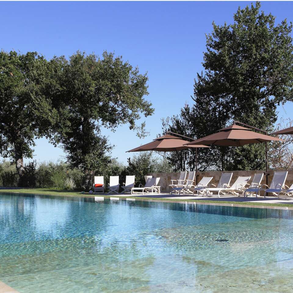 private infinity pool and bocce court