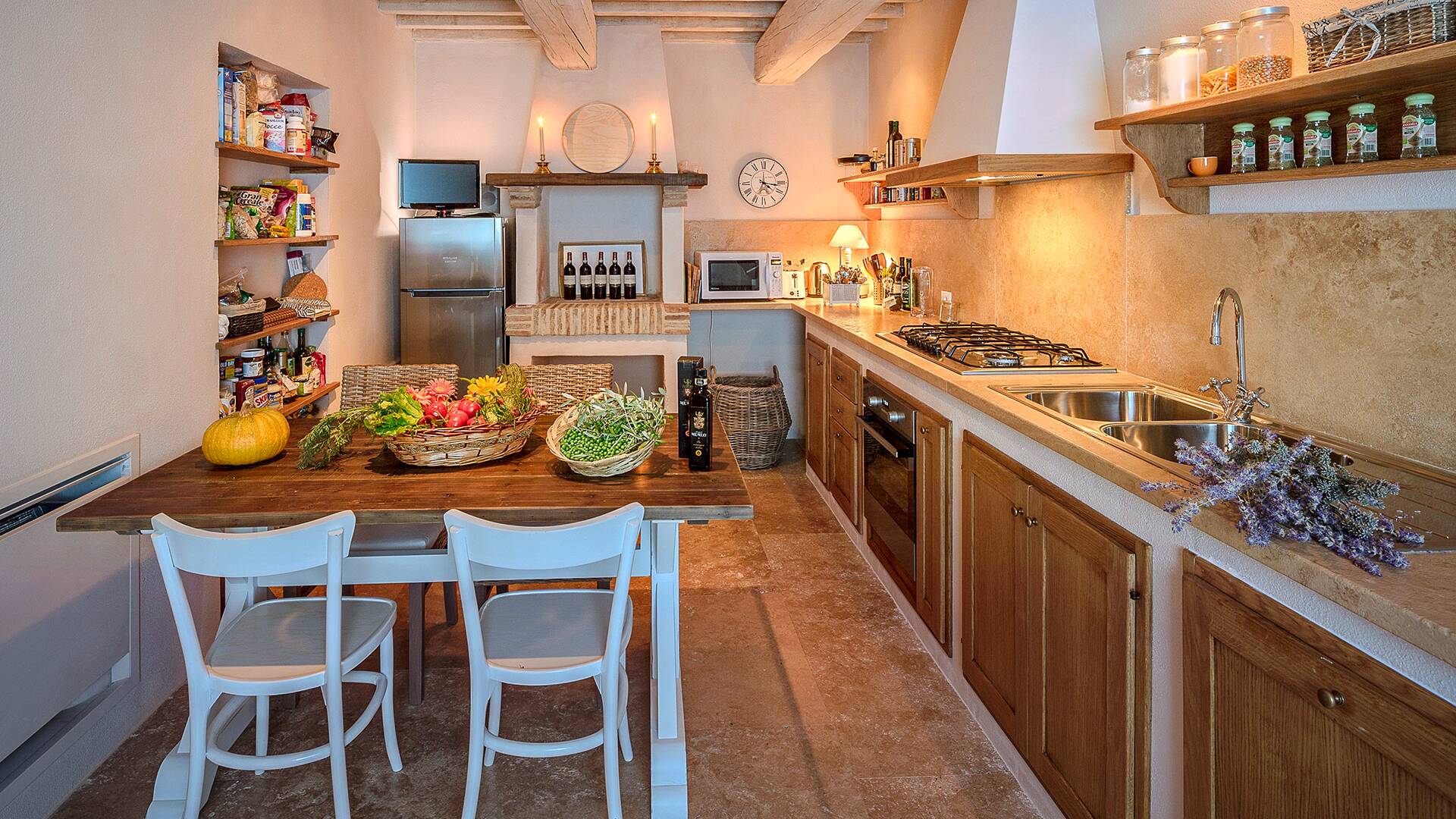 fully equipped kitchen with dining table