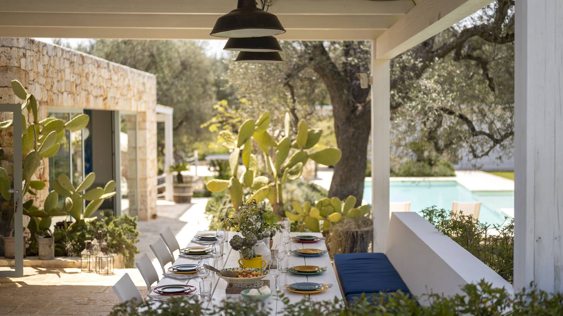 covered pergola with dining table