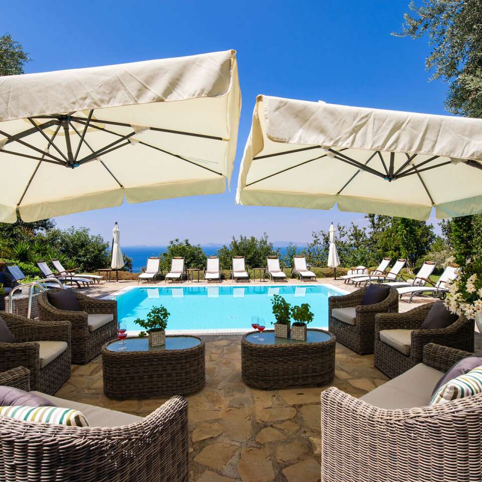 sunbathing area around swimming pool