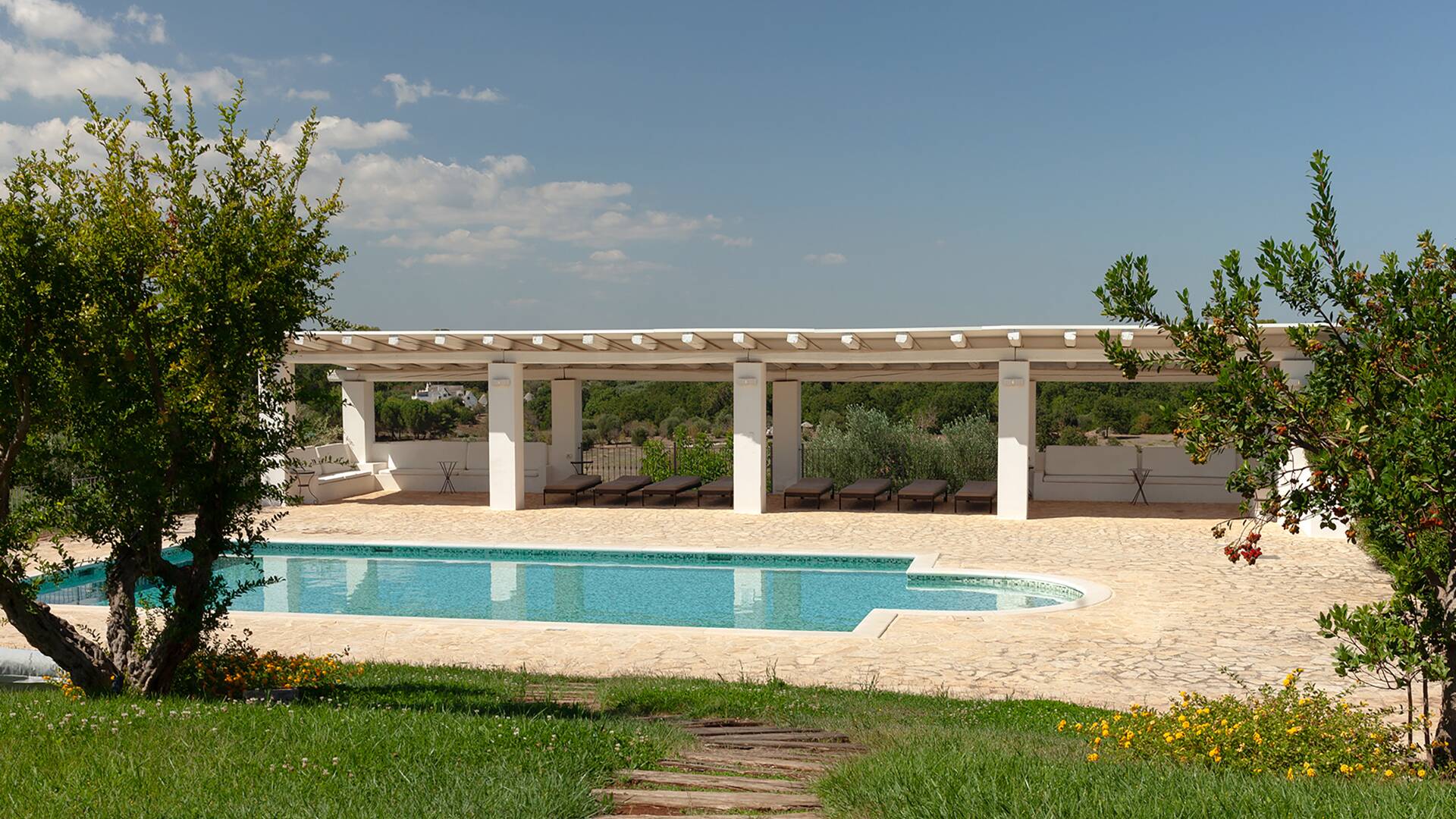 swimming pool with jacuzzi corner