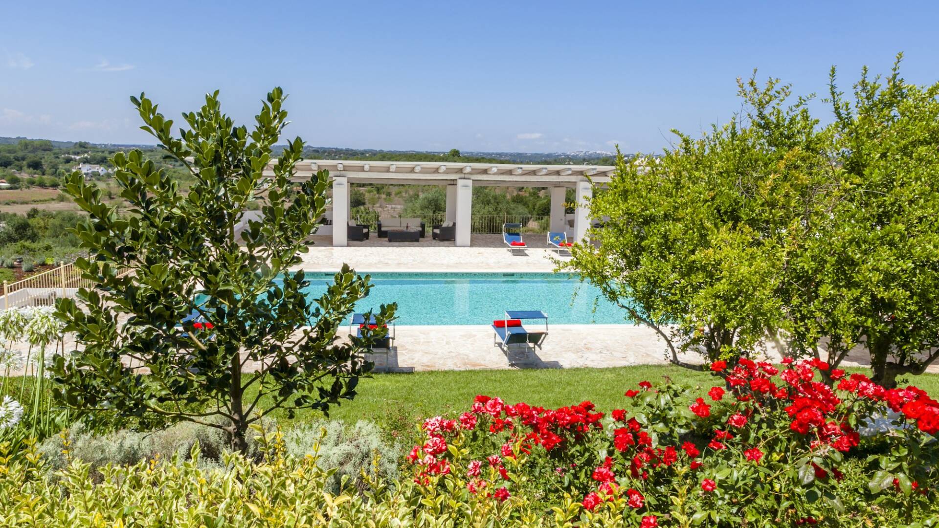 swimming pool and covered dining area