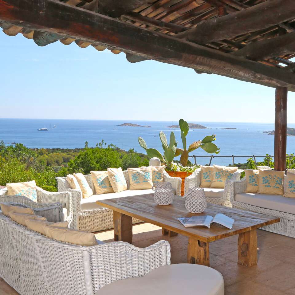 outdoor lounge area with sea view