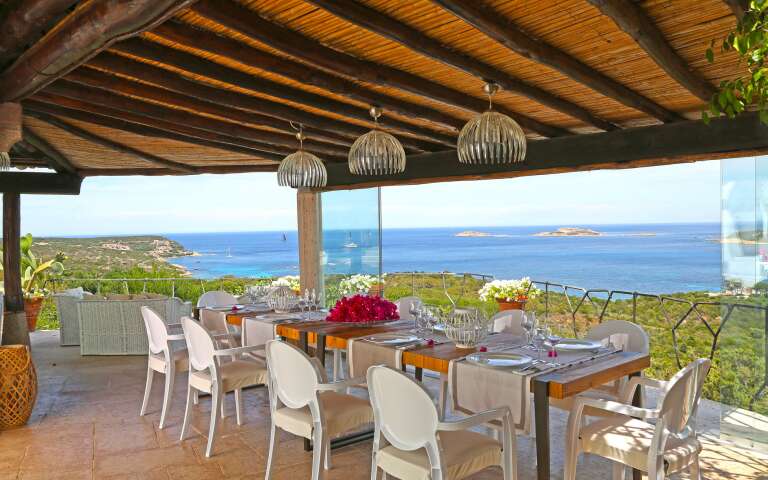 outdoor dining table with sea view